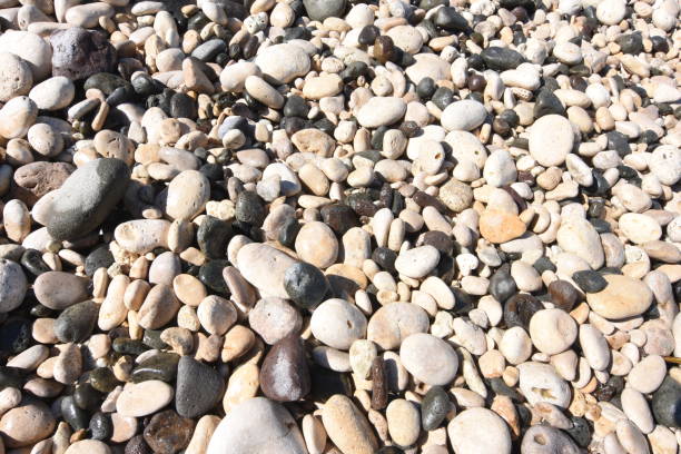 istock crushed stone on the seashore in Pidakan beach, Pacitan, Indonesia 956056564