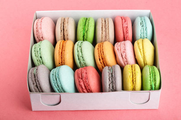istock colorful macaroons in box on red white background closeup 956056846
