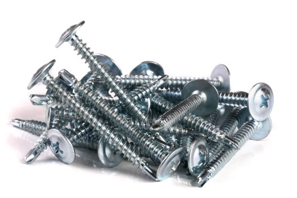 istock metal screws isolated on white background closeup 956056854