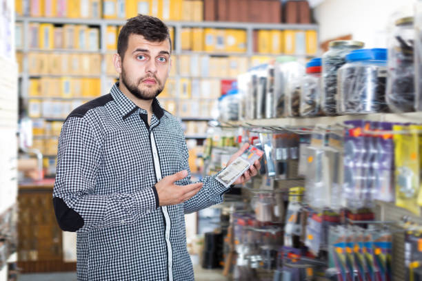 istock Ordinary man choosing new DIY details 956060682
