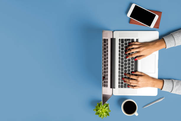 istock Female hands working on modern laptop. Business background 956062804
