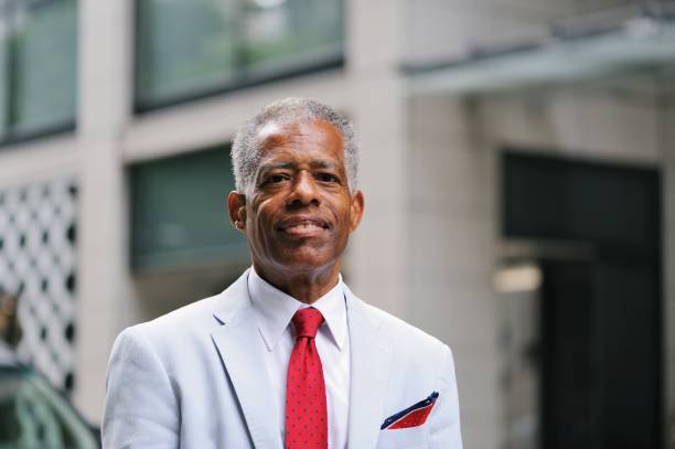 istock Sharply dressed businessman outside 956066358