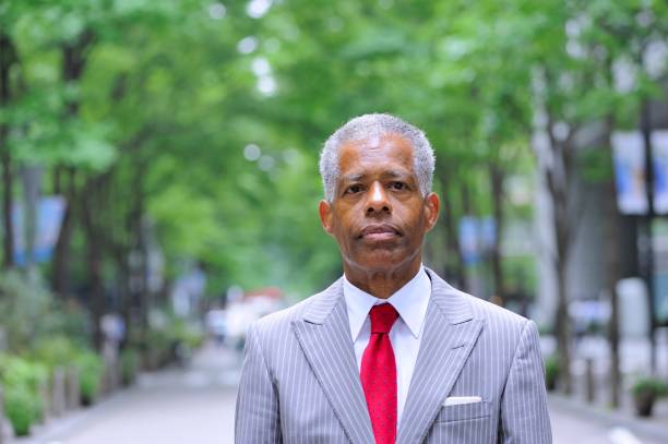 istock Sharply dressed businessman outside 956066500
