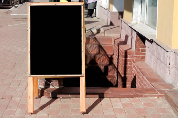 istock Sign stands at the entrance to cafe, empty for text 956071082