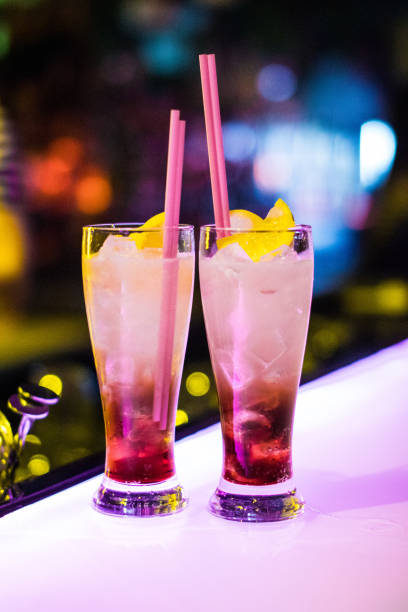 istock Two cocktails on a bar 956077634