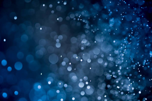 istock Christmas blur bokeh background texture abstract light glittering stars on bokeh. glitter vintage lights background 956078246
