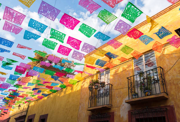 Colorful paper flags over street