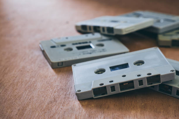 istock Audio cassette tapes on wooden table 956084492