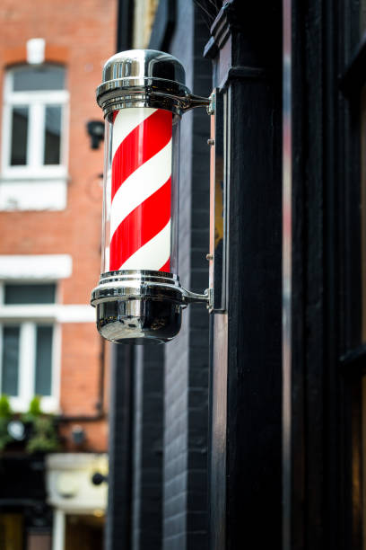 istock Barber shop exterior and barber pole 956095088
