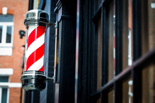 istock Barber shop exterior and barber pole 956095104