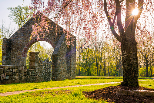 Beautiful sunrise at Lock Ridge Park, Pennsylvania. What looks like an abandoned old castle was a coal burning iron furnace in the past.