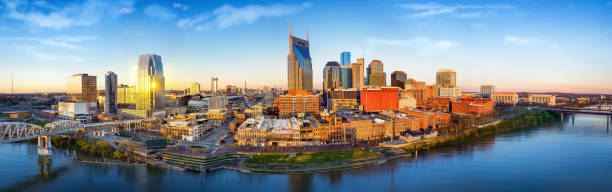 Nashville, TN skyline Nashville TN Skyline with Cumberland river in view nashville stock pictures, royalty-free photos & images