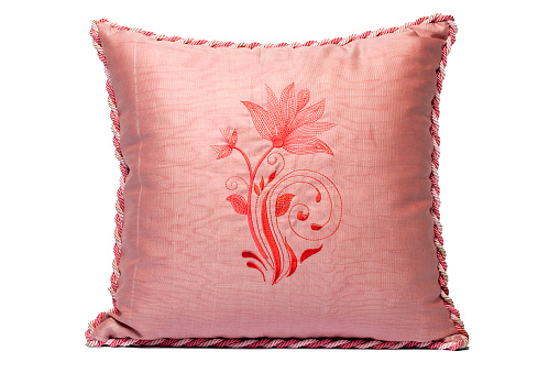 Pink cushion on white