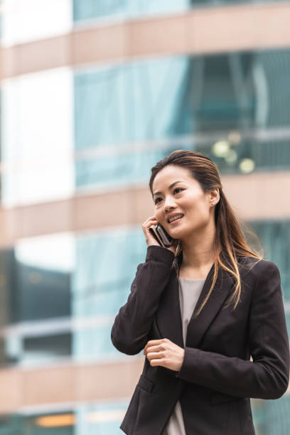 istock Businesswoman using smart phone 956102338