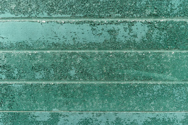 istock Rusty metal wall texture in green tone. 956105670