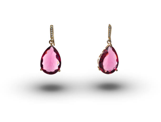 istock Beautiful earrings over white background 956105990