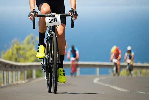 Cycling competition,cyclist athletes riding a race at high speed