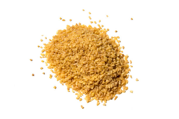 istock Bulgur heap pile isolated on white background 956108862
