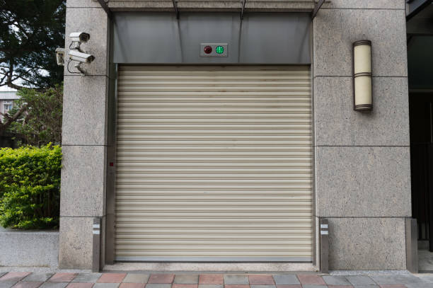 istock sidewalk by street wall & door 956109134