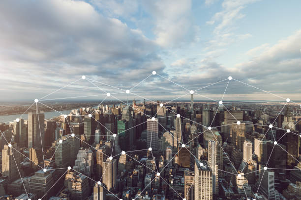 istock Manhattan Skyline and Blockchain Concept 956109648