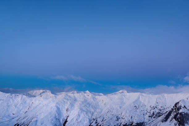 istock snowy mountain ridge winter morning 956117800