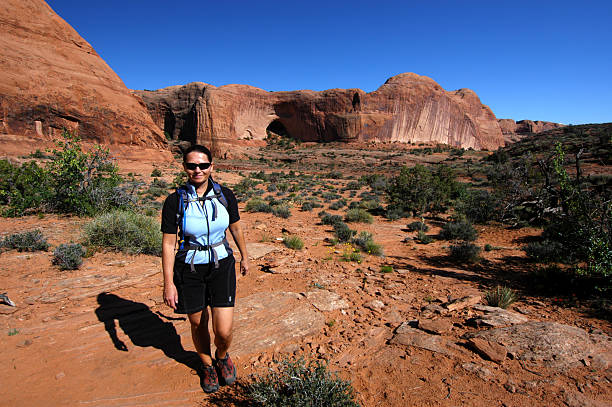 Woman hiking in Moab stock photo
