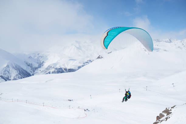 istock paragliding daytime in the mountainous areas 956118222