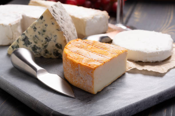 istock French cheeses plate in assortment, blue cheese, brie, munster, soft goat cheese 956120462