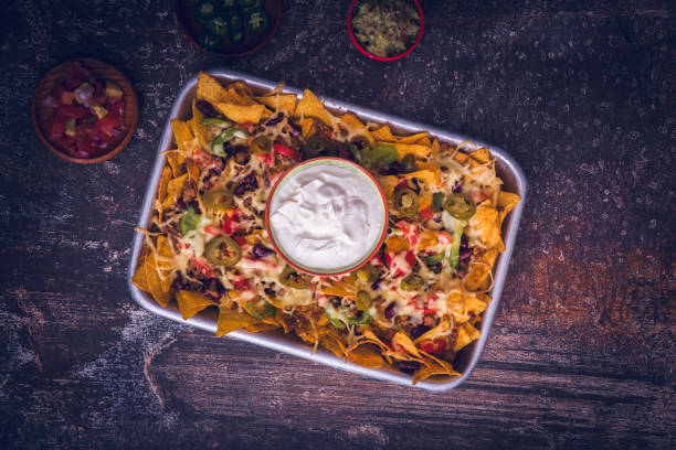 istock Nachos Tortilla Chips with Salsa, Minced Meat and Jalapenos 956124820