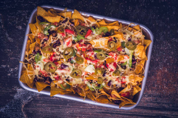 istock Nachos Tortilla Chips with Salsa, Minced Meat and Jalapenos 956124840