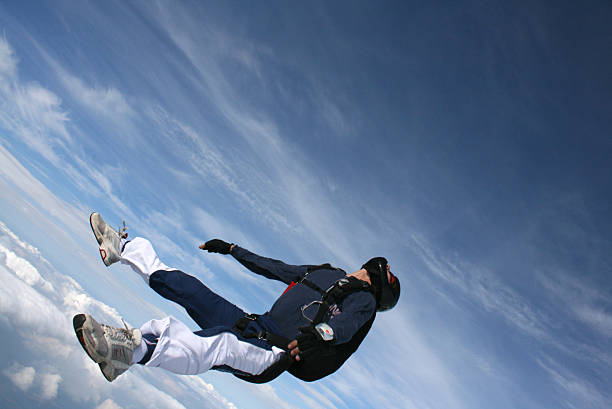 istock Skydiver falls through the air on his back 95613638