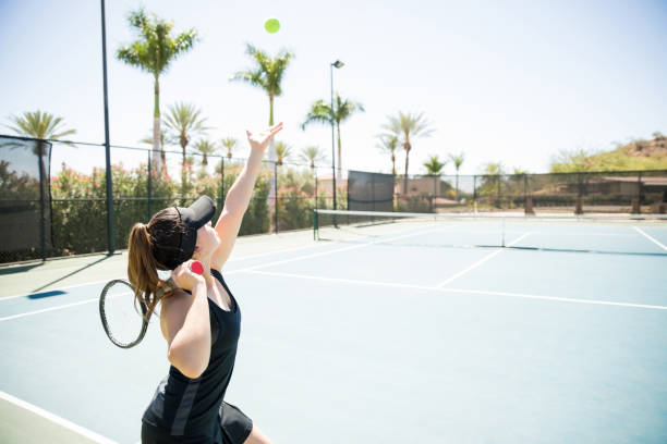 istock Player serving tennis ball 956138572