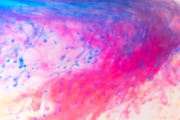 istock Acrylic colors and ink in water. Abstract frame background. Isolated on white. 956139910