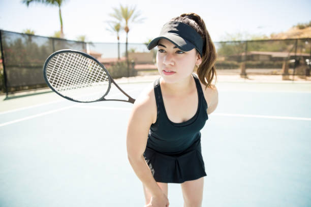 istock Female tennis player training 956139956