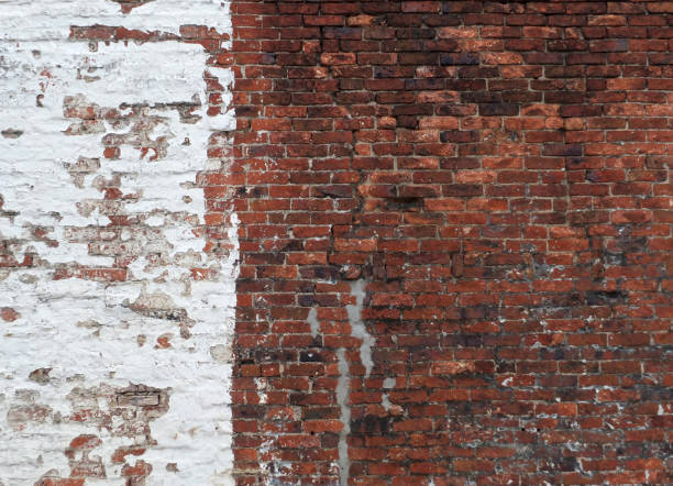 istock old red brick wall half painted in old peeling white paint or whitewash 956148518