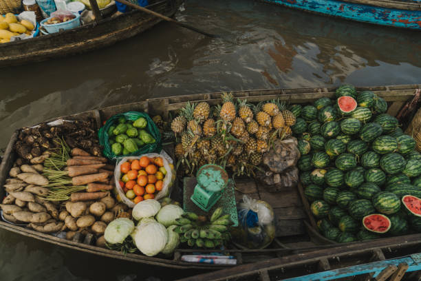 istock Boat with fruits on   Mekong delta 956150866