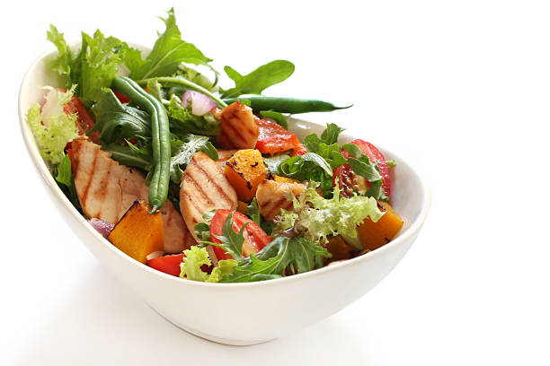 Salad with grilled chicken breast, mixed greens, roasted vegetables, tomatoes, beans, capsicum, onion, pumpkin.  Delicious healthy eating.  Please see also: