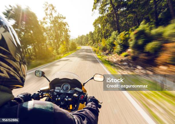 Motorbike Ride On A Country Road Stock Photo - Download Image Now - Motorcycle, Riding, Speed