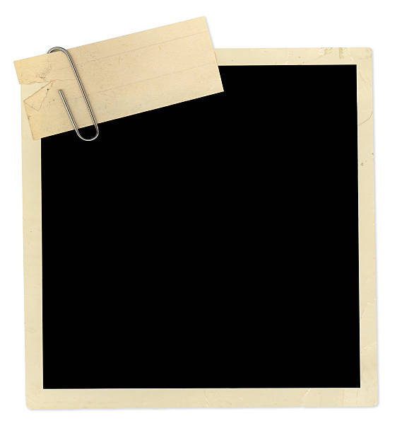 istock Black empty old photo frame with a paper clip 95615466