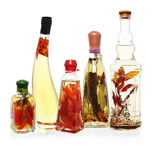 öle und essig - vinegar bottle herb white stock-fotos und bilder