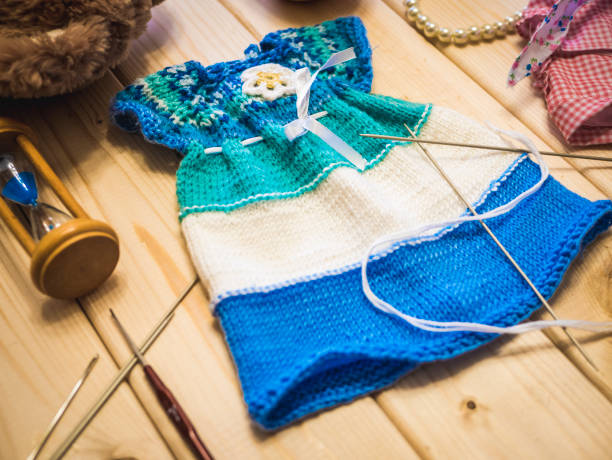 istock knitting concept on the wooden surface close up 956157610
