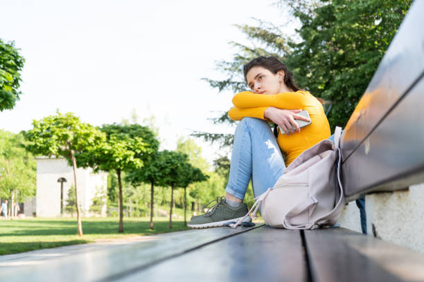 traurige teenager - unemployment fear depression women stock-fotos und bilder