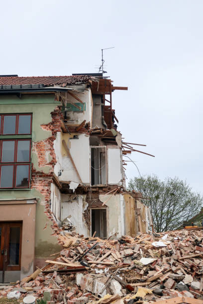istock Half a house. Demolition / tear down a house 956161678