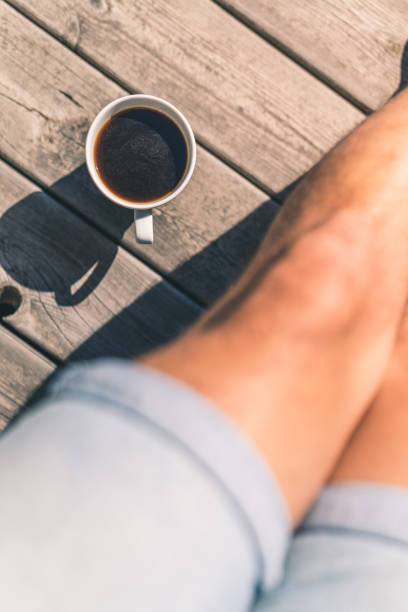 istock Point of View of a Man Drinking Coffee 956161810