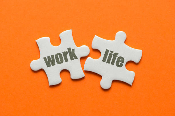 istock The word work life on two matching puzzle on orange background 956163536