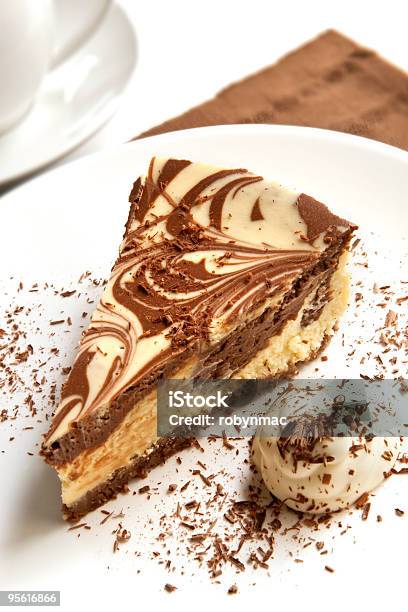 Chocolate And Vanilla Cheesecake On A White Plate Stock Photo - Download Image Now - Chocolate Cheesecake, Cake, Cheesecake