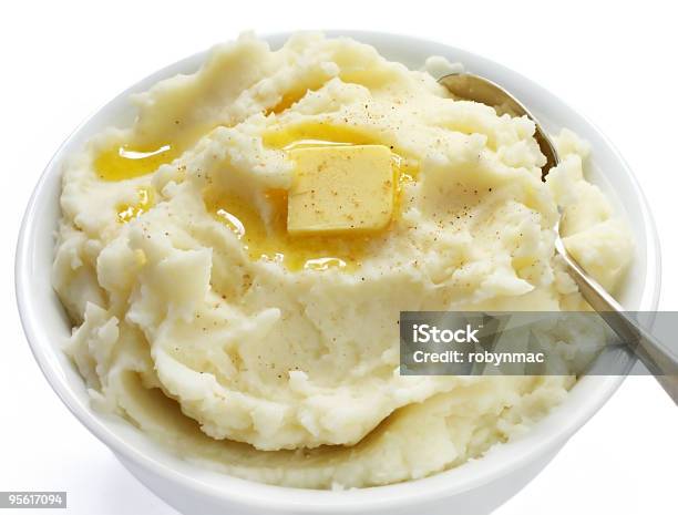 A Bowl Of Finely Mashed Potato With Butter On Top Stock Photo - Download Image Now - Mashed Potatoes, White Background, Butter