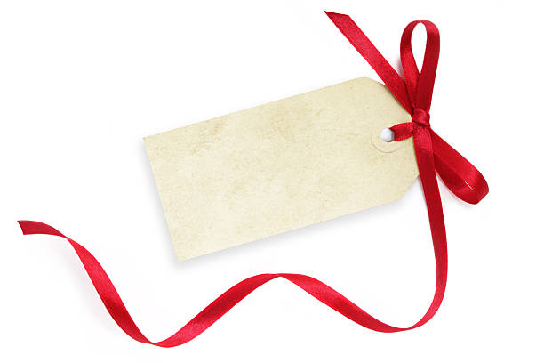 istock Blank gift tag with red ribbon on white background 95617266