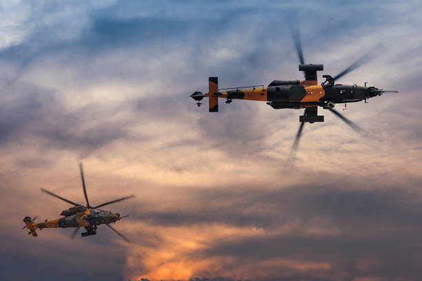 istock Military gunships flying against dramatic sky 956172926