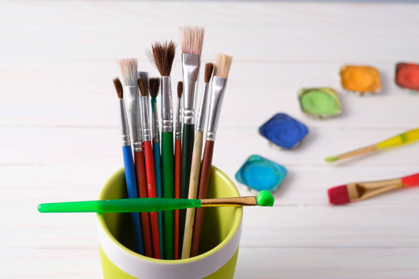 istock Paint brush in the mug 956176194
